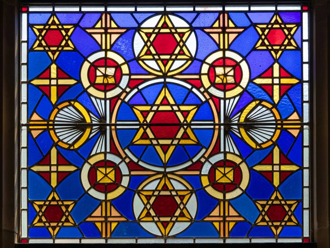 A stained glass style arrangement of geometric religious motifs
